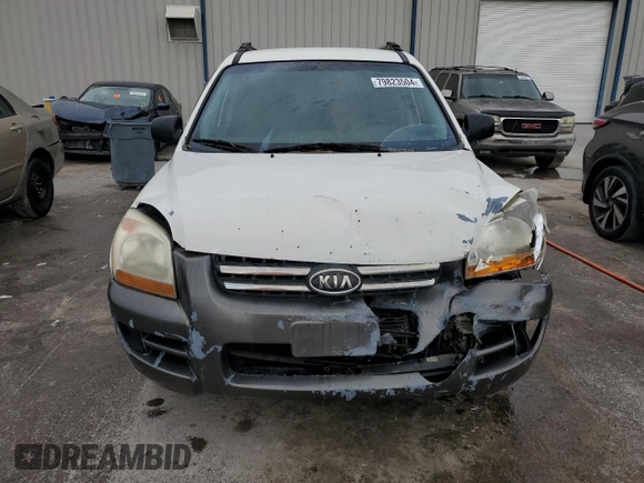 2005 Kia Sportage LX with VIN KNDJF723557078730, listed as a Copart auction lot 79823504 with 166,509 mi miles and Salvage Title. Bid and sale history available at carsss.com. Image 5.