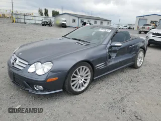 2008 Mercedes-Benz SL 550 with VIN WDBSK71FX8F141468, listed as a Copart auction lot 61036285 with 109,698 mi miles and Salvage title. Bid and sale history available at DreamBid. Image 1.