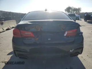 2018 BMW 5 Series M550i xDrive with VIN WBAJB9C52JB035913, listed as a Copart auction lot 51441195 with 42,205 mi miles and Salvage Title. Bid and sale history available at carsss.com. Image 6.
