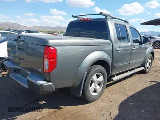 2006 Nissan Frontier SE with VIN 1N6AD07U46C417708, listed as a IAAI auction lot 42419826 with 157,204 mi miles and . Bid and sale history available at DreamBid. Image 4.