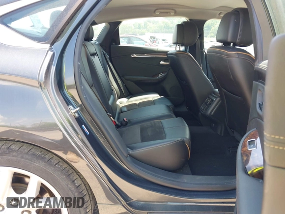 2014 Chevrolet Impala LT with VIN 2G1125S36E9156519, listed as a IAAI auction lot 42145424 with 97,755 mi miles and . Bid and sale history available at DreamBid. Image 8.
