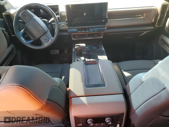 2024 GMC Hummer EV 3X z VIN 1GKB0RDC6RU103340, wystawiony jako Copart lot #79773874 z przebiegiem Nie podano mil oraz Szkody całkowita. Historia ofert i sprzedaży dostępna na DreamBid. Obrazek 8.