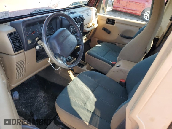 2002 Jeep Wrangler Sahara with VIN 1J4FA59S22P704603, listed as a Copart auction lot 77554334 with 99,758 mi miles and Salvage Title. Bid and sale history available at carsss.com. Image 8.