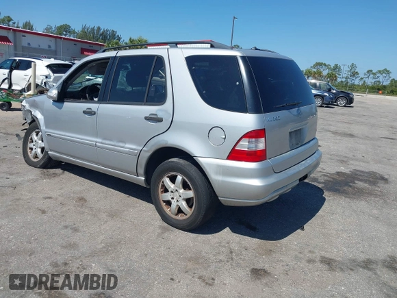 2004 Mercedes-Benz M 350 with VIN 4JGAB57E84A472827, listed as a IAAI auction lot 42135826 with 221,174 mi miles and . Bid and sale history available at DreamBid. Image 3.