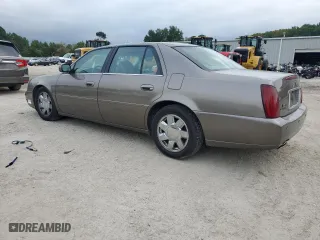 2000 Cadillac DeVille DTS with VIN 1G6KF5794YU249059, listed as a Copart auction lot 71614494 with 121,611 mi miles and Salvage Title. Bid and sale history available at carsss.com. Image 2.