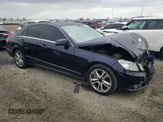 2010 Mercedes-Benz E 550 Luxury with VIN WDDHF7CB1AA248797, listed as a Copart auction lot 50844995 with 196,371 mi miles and Salvage Title. Bid and sale history available at DreamBid. Image 4.