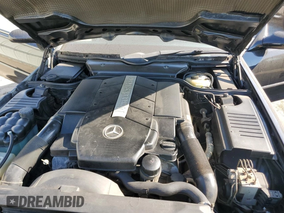 1999 Mercedes-Benz SL-Class with VIN WDBFA68F1XF184891, listed as a Copart auction lot 77082284 with 96,379 mi miles and Salvage Title. Bid and sale history available at carsss.com. Image 11.