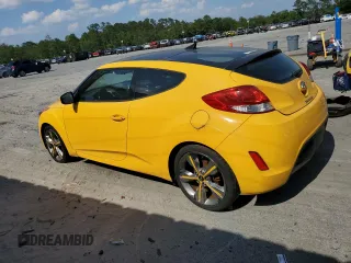 2016 Hyundai Veloster z VIN KMHTC6ADXGU265581, wystawiony jako Copart lot #57428485 z przebiegiem 125 612 mil mil oraz Tytuł czysty. Historia ofert i sprzedaży dostępna na DreamBid. Obrazek 2.