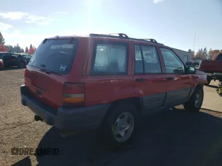 1998 Jeep Grand Cherokee Laredo with VIN 1J4GZ58S3WC245142, listed as a Copart auction lot 79434534 with 276,971 mi miles and Salvage Title. Bid and sale history available at carsss.com. Image 3.