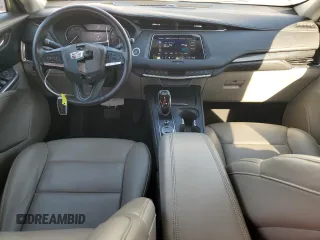2022 Cadillac XT4 FWD Premium Luxury with VIN 1GYFZCR45NF100049, listed as a Copart auction lot 50213255 with 62,391 mi miles and Salvage title. Bid and sale history available at DreamBid. Image 8.