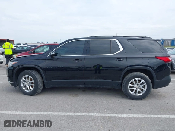 2020 Chevrolet Traverse LT Cloth z VIN 1GNERGKW7LJ191671, wystawiony jako IAAI lot #42384078 z przebiegiem 89 650 mil mil oraz . Historia ofert i sprzedaży dostępna na DreamBid. Obrazek 14.