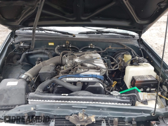 1995 Toyota T100 z VIN JT4VD11E8S0006805, wystawiony jako IAAI lot #41867368 z przebiegiem 261 130 mil mil oraz . Historia ofert i sprzedaży dostępna na DreamBid. Obrazek 10.