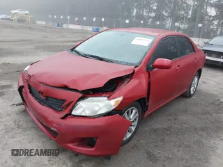 2009 Toyota Corolla with VIN JTDBL40E899064668, listed as a IAAI auction lot 41889355 with 168,145 mi miles. Bid and sale history available at carsss.com. Image 2.