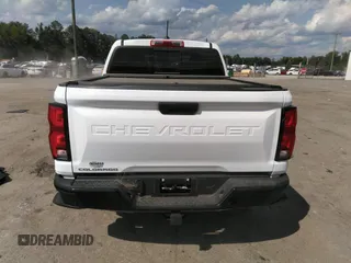 2023 Chevrolet Colorado 4WD Z71 with VIN 1GCPTDEK4P1249624, listed as a IAAI auction lot 42130950 with 9,795 mi miles and . Bid and sale history available at DreamBid. Image 16.