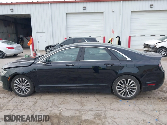 2017 Lincoln MKZ Hybrid Premiere z VIN 3LN6L5KU6HR622317, wystawiony jako IAAI lot #42124629 z przebiegiem 62 674 mil mil oraz . Historia ofert i sprzedaży dostępna na DreamBid. Obrazek 15.