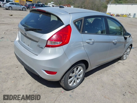 2013 Ford Fiesta SE with VIN 3FADP4EJ3DM136332, listed as a IAAI auction lot 42142556 with 69,979 mi miles and . Bid and sale history available at DreamBid. Image 4.
