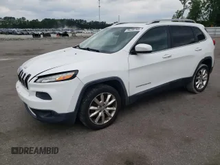 2014 Jeep Cherokee Limited with VIN 1C4PJLDB1EW227128, listed as a Copart auction lot 56298765 with 217,884 mi miles and Salvage title. Bid and sale history available at DreamBid. Image 1.