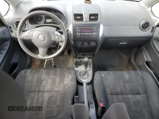 2012 Suzuki SX4 LE with VIN JS2YC5A34C6300079, listed as a Copart auction lot 68414434 with 111,661 mi miles and Salvage Title. Bid and sale history available at carsss.com. Image 8.