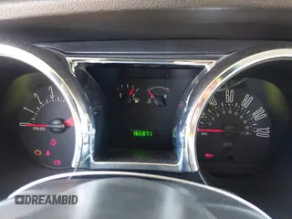 2007 Ford Mustang Deluxe with VIN 1ZVFT80N575345515, listed as a IAAI auction lot 42008753 with 165,871 mi miles and . Bid and sale history available at DreamBid. Image 7.