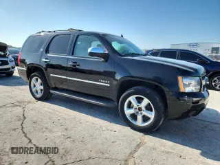 2014 Chevrolet Tahoe LTZ with VIN 1GNSKCE09ER116627, listed as a Copart auction lot 64214685 with 240,970 mi miles and Clean title. Bid and sale history available at DreamBid. Image 4.