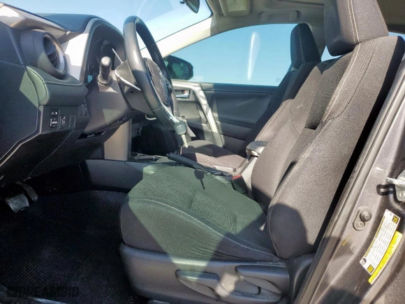 2016 Toyota RAV4 XLE with VIN 2T3WFREV2GW292774, listed as a Copart auction lot 52349865 with 96,896 mi miles and Salvage Title. Bid and sale history available at carsss.com. Image 7.