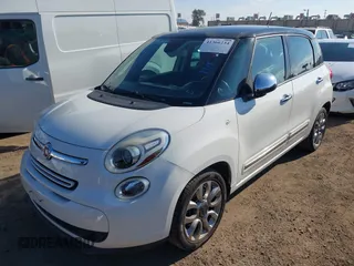 2014 FIAT 500L Lounge with VIN ZFBCFACH9EZ004041, listed as a IAAI auction lot 41366234 with 106,769 mi miles and . Bid and sale history available at DreamBid. Image 2.
