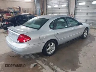 2003 Ford Taurus SES Standard with VIN 1FAFP55U13G222465, listed as a IAAI auction lot 42168336 with 128,078 mi miles. Bid and sale history available at carsss.com. Image 4.