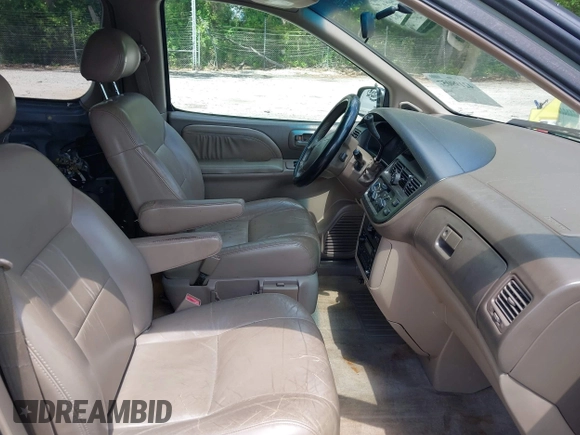 1998 Toyota Sienna LE with VIN 4T3ZF13C9WU029468, listed as a IAAI auction lot 42199057 with Not provided miles and . Bid and sale history available at DreamBid. Image 5.