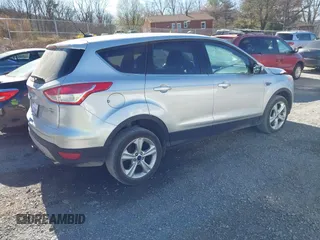 2014 Ford Escape SE with VIN 1FMCU9G95EUE49423, listed as a IAAI auction lot 41792045 with 56,733 mi miles and . Bid and sale history available at carsss.com. Image 4.