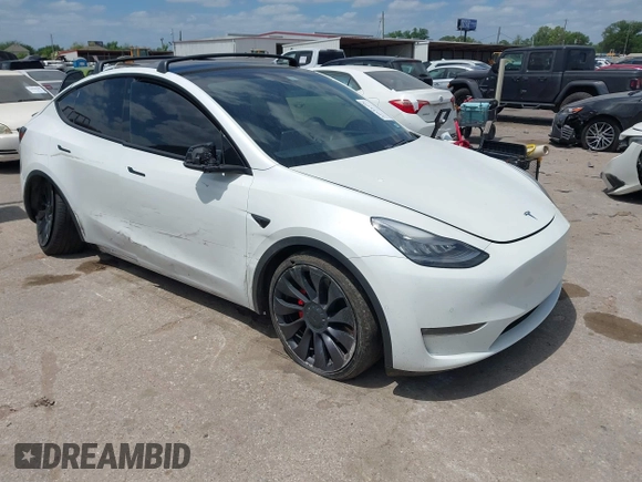 2021 Tesla Model Y Performance with VIN 5YJYGDEF9MF081798, listed as a IAAI auction lot 42033358 with 64,679 mi miles and . Bid and sale history available at DreamBid. Image 1.