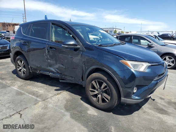 2018 Toyota RAV4 XLE with VIN JTMWFREV9JJ745584, listed as a Copart auction lot 51451885 with 114,985 mi miles and Salvage Title. Bid and sale history available at carsss.com. Image 4.
