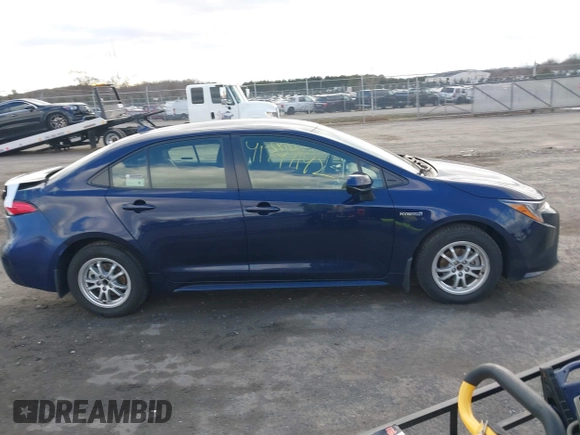 2021 Toyota Corolla Hybrid LE with VIN JTDEAMDE9MJ021431, listed as a IAAI auction lot 41747142 with 165,680 mi miles. Bid and sale history available at carsss.com. Image 13.