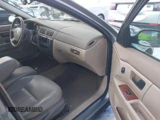 2004 Mercury Sable LS Premium with VIN 1MEFM55S04A619587, listed as a IAAI auction lot 41571950 with 125,444 mi miles and . Bid and sale history available at DreamBid. Image 5.