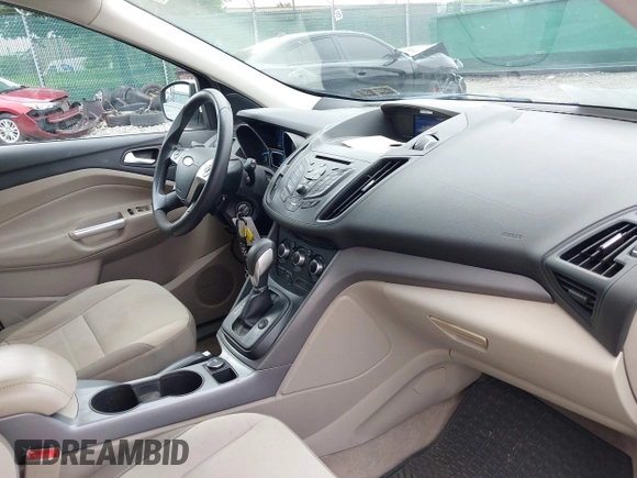 2014 Ford Escape SE with VIN 1FMCU9GX9EUC61521, listed as a IAAI auction lot 42535244 with 129,315 mi miles and . Bid and sale history available at DreamBid. Image 12.
