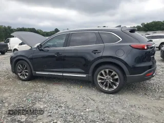 2016 Mazda CX-9 Grand Touring z VIN JM3TCADY7G0122768, wystawiony jako Copart lot #65624615 z przebiegiem 82 388 mil mil oraz Czysty tytuł • Clean title. Historia ofert i sprzedaży dostępna na DreamBid. Obrazek 2.