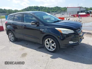 2013 Ford Escape SEL z VIN 1FMCU9HX1DUB97939, wystawiony jako IAAI lot #42293561 z przebiegiem 196 951 mil mil oraz . Historia ofert i sprzedaży dostępna na DreamBid. Obrazek 1.