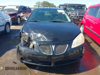 2005 Pontiac G6 GT with VIN 1G2ZH548154165427, listed as a IAAI auction lot 41650622 with 149,187 mi miles. Bid and sale history available at carsss.com. Image 12.