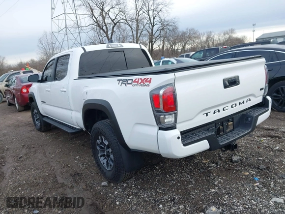 2023 Toyota Tacoma SR5 z VIN 3TMDZ5BN2PM144461, wystawiony jako IAAI lot #41565934 z przebiegiem 75 547 mil mil oraz . Historia ofert i sprzedaży dostępna na DreamBid. Obrazek 3.