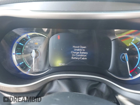 2021 Chrysler Pacifica Hybrid Touring L with VIN 2C4RC1L76MR594571, listed as a IAAI auction lot 40255745 with 58,163 mi miles and . Bid and sale history available at DreamBid. Image 7.