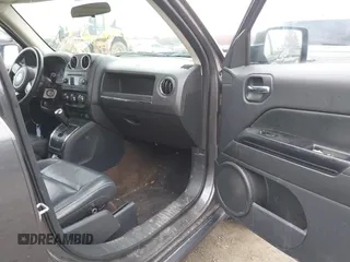 2015 Jeep Patriot High Altitude with VIN 1C4NJPFA2FD297575, listed as a IAAI auction lot 41848731 with 77,149 mi miles and . Bid and sale history available at DreamBid. Image 5.