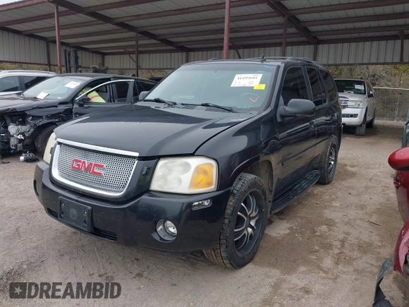 2008 GMC Envoy Denali with VIN 1GKES63M182191403, listed as a IAAI auction lot 41499601 with 217,071 mi miles. Bid and sale history available at carsss.com. Image 2.