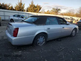 2002 Cadillac DeVille DHS z VIN 1G6KE57Y02U304933, wystawiony jako Copart lot #86919134 z przebiegiem Nie podano mil oraz Czysty tytuł • Clean title. Historia ofert i sprzedaży dostępna na DreamBid. Obrazek 3.