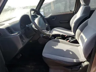 1997 Suzuki Sidekick JX z VIN 2S3TD03V4V6403519, wystawiony jako Copart lot #49666085 z przebiegiem 54 577 mil mil oraz Szkoda całkowita • Salvage title. Historia ofert i sprzedaży dostępna na DreamBid. Obrazek 7.