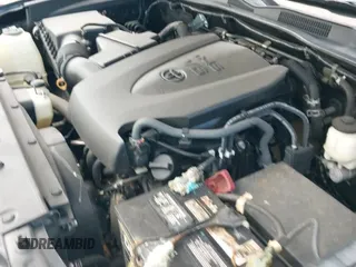 2019 Toyota Tacoma SR with VIN 5TFCZ5AN0KX177474, listed as a IAAI auction lot 43120920 with 121,109 mi miles and . Bid and sale history available at DreamBid. Image 20.