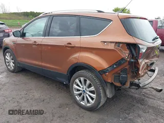 2017 Ford Escape Titanium with VIN 1FMCU0JD3HUB20846, listed as a IAAI auction lot 42182260 with 28,610 mi miles and . Bid and sale history available at DreamBid. Image 3.