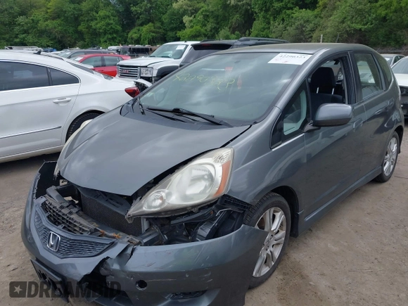 2011 Honda Fit Sport z VIN JHMGE8H53BS004872, wystawiony jako IAAI lot #42290323 z przebiegiem 145 685 mil mil oraz . Historia ofert i sprzedaży dostępna na DreamBid. Obrazek 2.