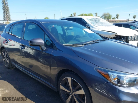 2017 Subaru Impreza Sport with VIN 4S3GTAK61H1731989, listed as a IAAI auction lot 41819366 with 93,369 mi miles. Bid and sale history available at carsss.com. Image 13.