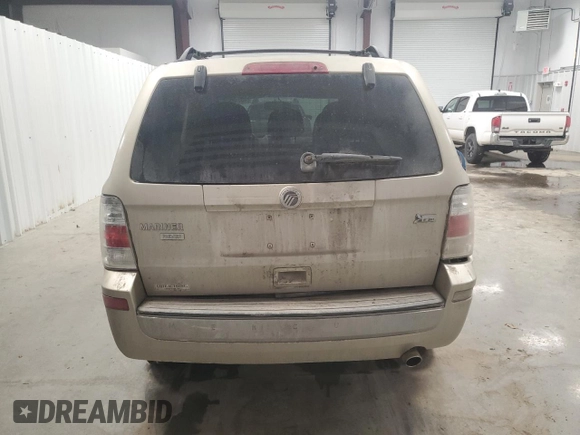 2010 Mercury Mariner z VIN 4M2CN9BG1AKJ04266, wystawiony jako Copart lot #43746595 z przebiegiem Nie podano mil oraz Szkoda całkowita • Salvage title. Historia ofert i sprzedaży dostępna na DreamBid. Obrazek 6.