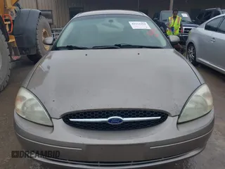 2002 Ford Taurus SES Standard with VIN 1FAFP55S42A248753, listed as a IAAI auction lot 42112264 with 219,560 mi miles. Bid and sale history available at carsss.com. Image 6.