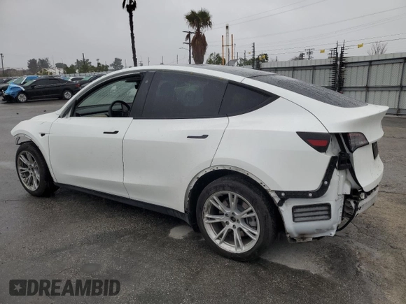 2020 Tesla Model Y Long Range with VIN 5YJYGDEE5LF053938, listed as a Copart auction lot 43381985 with 69,291 mi miles and Salvage Title. Bid and sale history available at DreamBid. Image 2.
